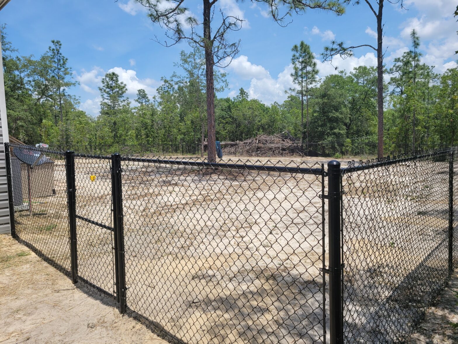 Photo of a residential chain link fence installed by a Ocala Florida fence contractor